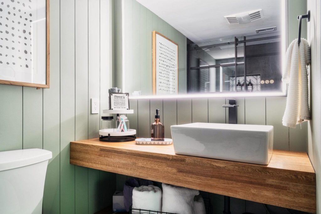 Updated master bathroom with custom built floating vanity and vessel sink. Cabin in Gatlinburg